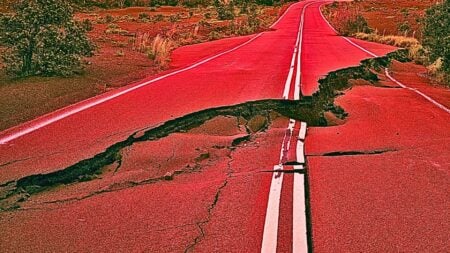 An image of a crack in the road to represent real estate market shifts.