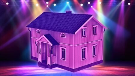 An image of a home under the spotlights on a stage to represent the social media marketing mistakes made when focusing on yourself.