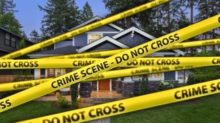 An image of crime scene tape covering a listing to represent body found at real estate listing.