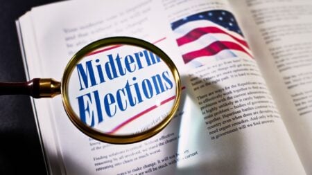 Voters at polling booths as midterm housing ballot measures go before voters in Florida, California and Massachusetts