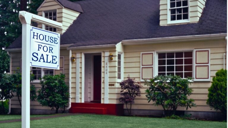 Existing-home sales September 2026: for-sale sign outside a suburban home