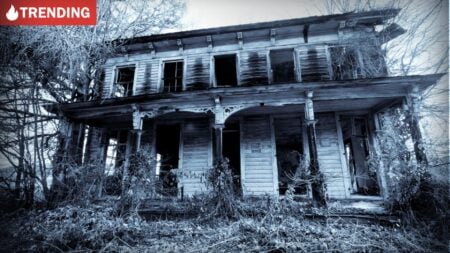 Older two-story house, illustrating scary Zillow listings featured in Halloween content